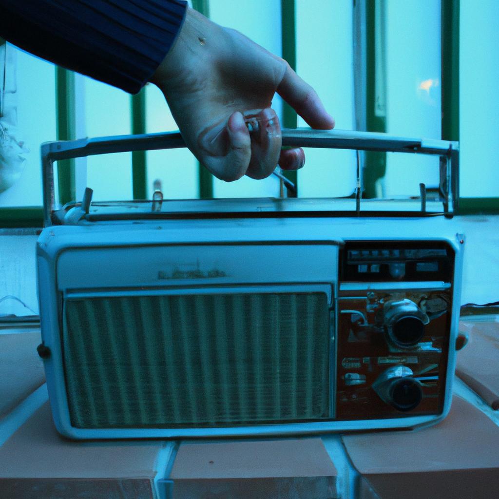Person holding a vintage radio