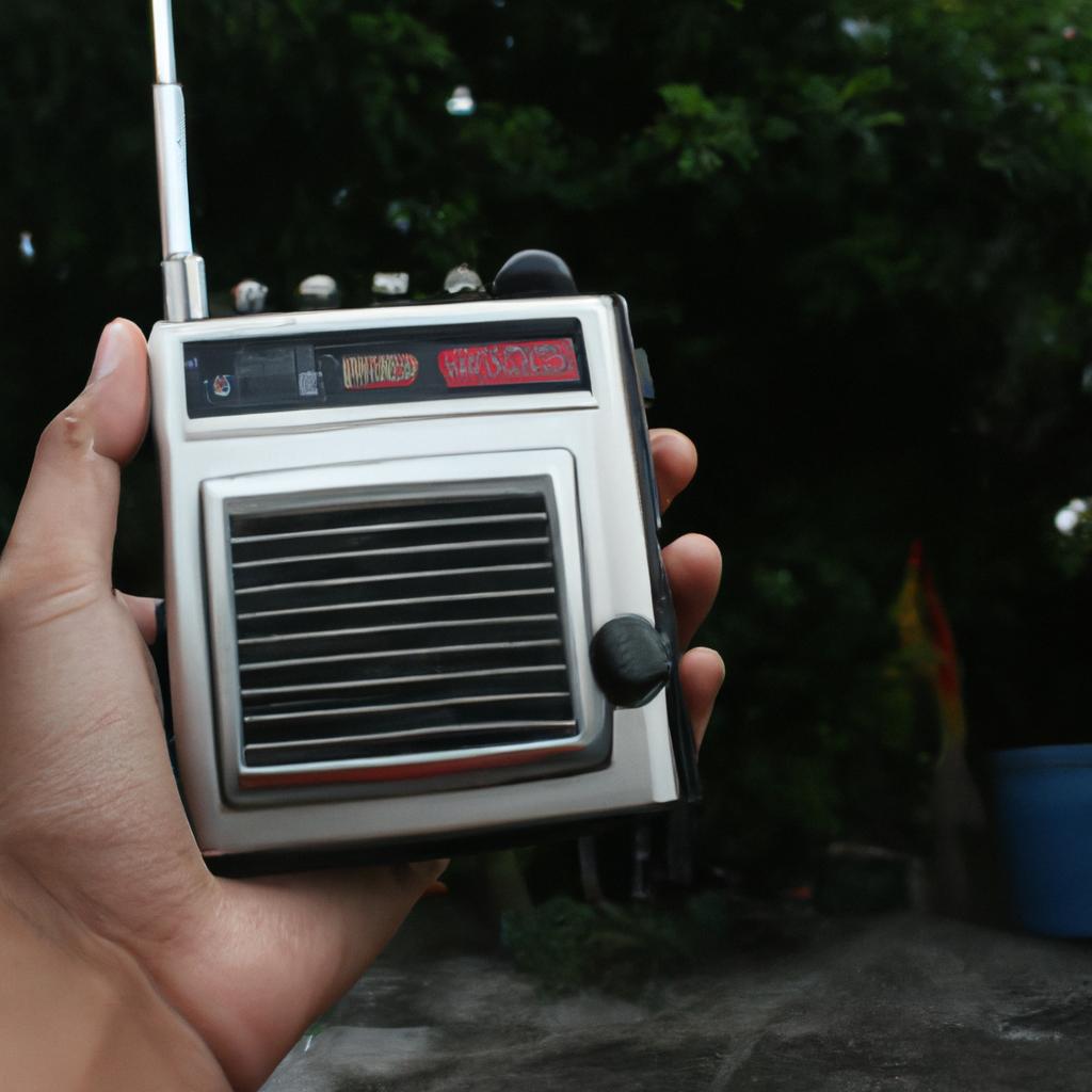 Person holding a digital radio