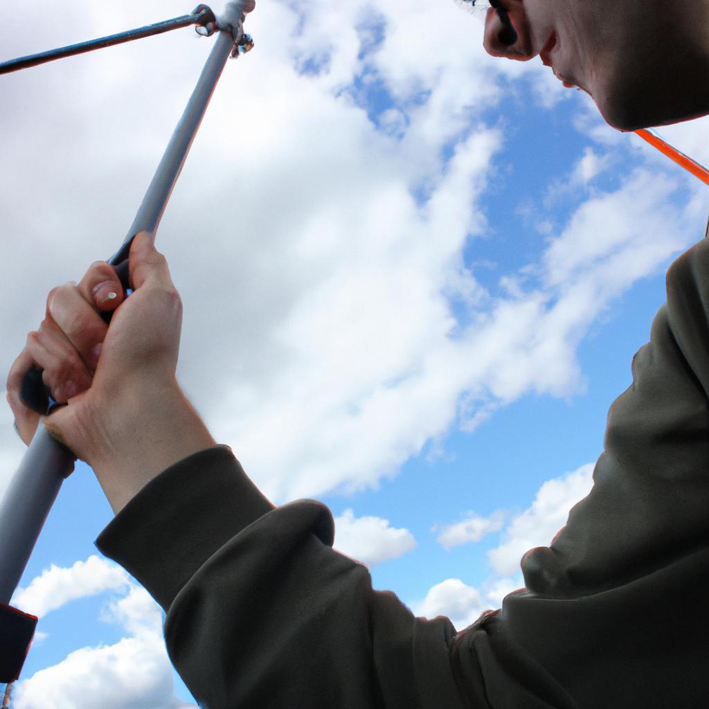 Person adjusting telescopic radio antenna